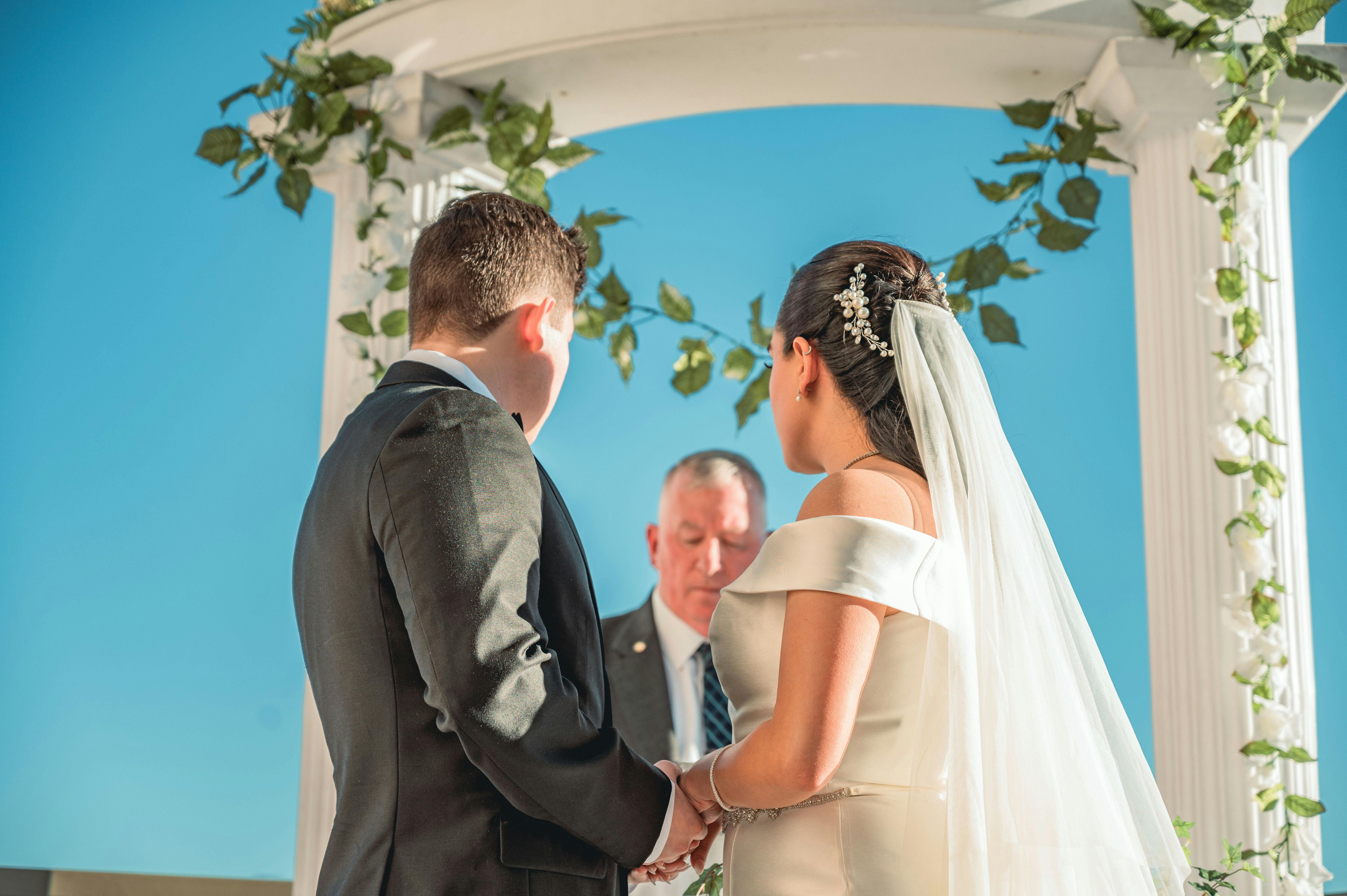 Wedding Officiant Preparing for Ceremony